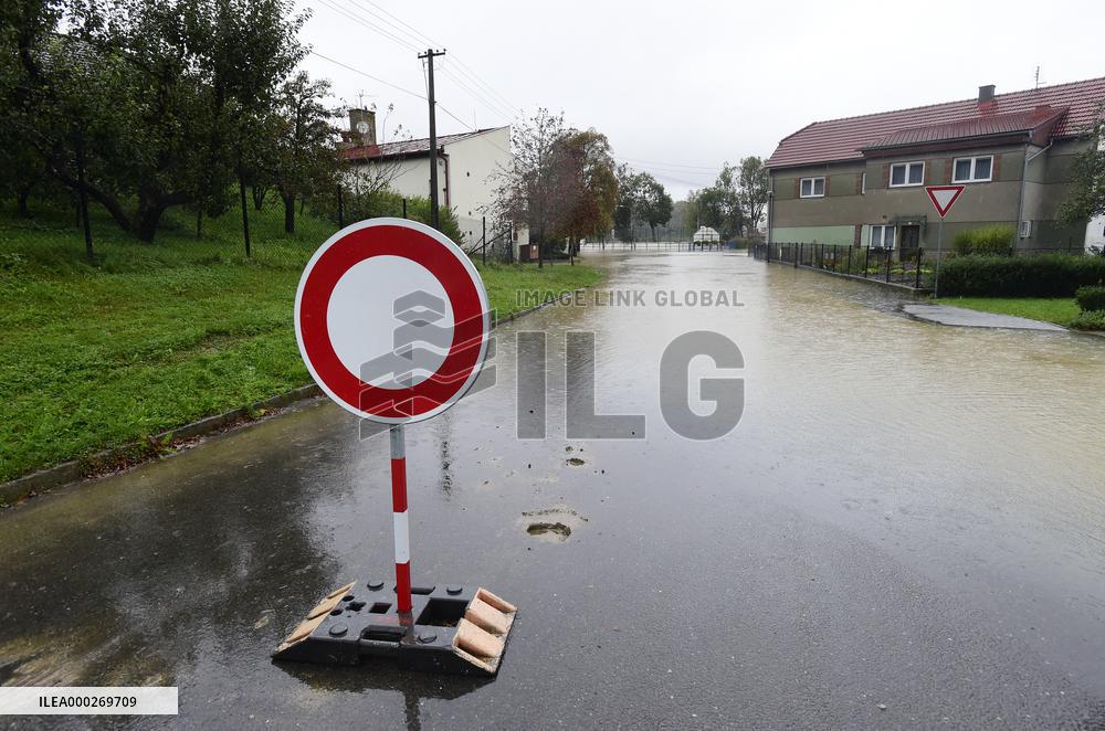 Heavy rainfalls, flood, River Becva, village Usti