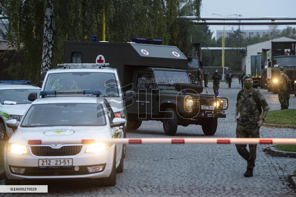 Military convoy with equipment for field hospital, container