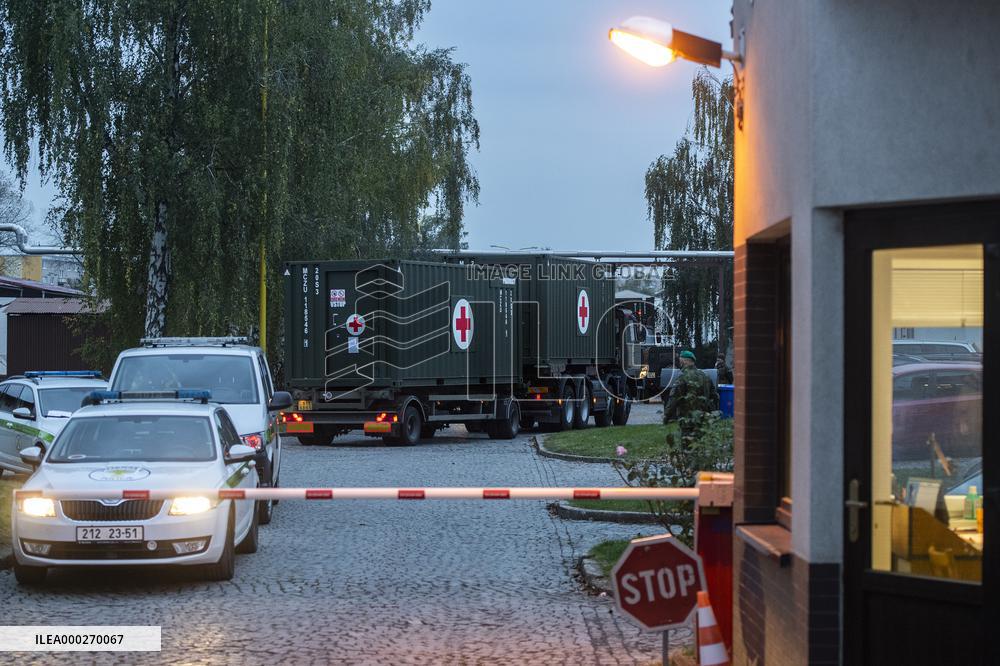 Military convoy with equipment for field hospital, container