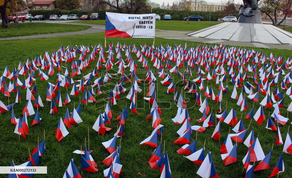 Covid-19, coronavirus memorial, Czech flags, park, Prague