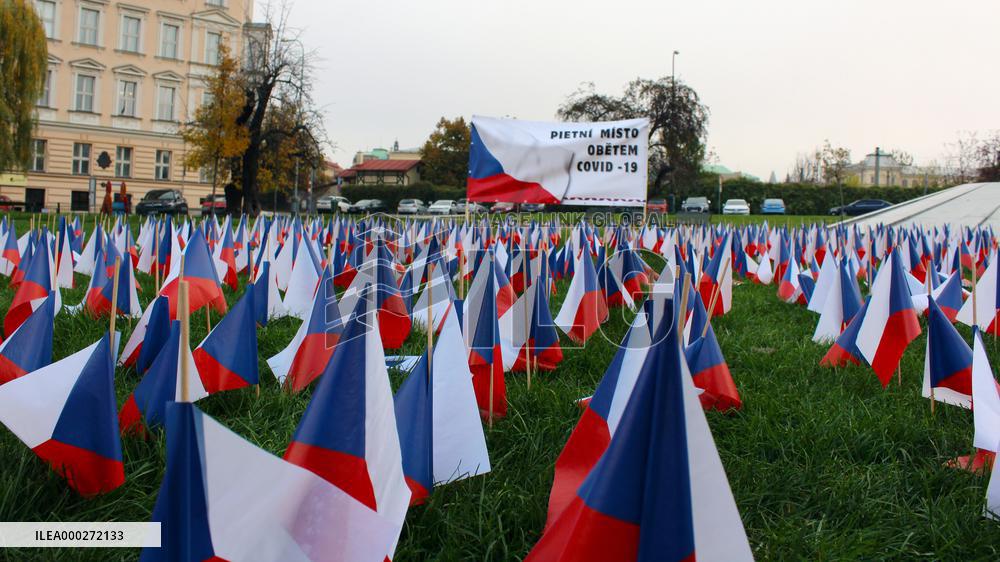 Covid-19, coronavirus memorial, Czech flags, park, Prague
