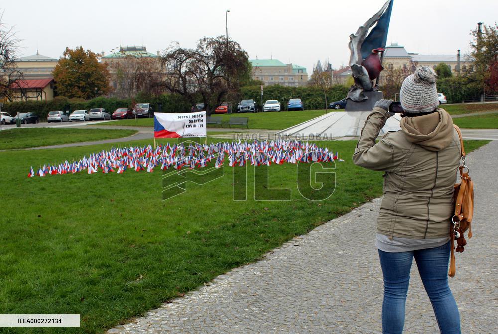 Covid-19, coronavirus memorial, Czech flags, park, Prague