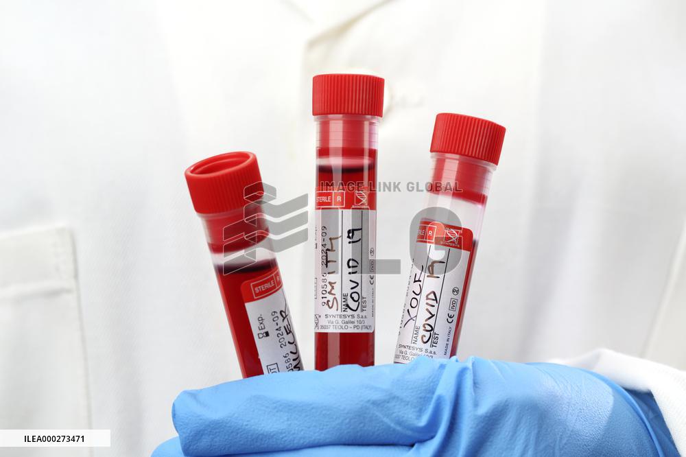 Test, testing, covid-19, coronavirus, vaccine, protective clothing, gloves, blood, laboratory flash, antibodies, research, glass tube, tubes