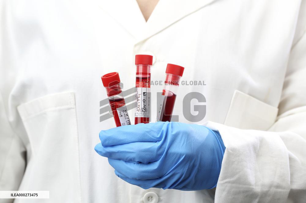 Test, testing, covid-19, coronavirus, vaccine, protective clothing, gloves, blood, laboratory flash, antibodies, research, glass tube, tubes