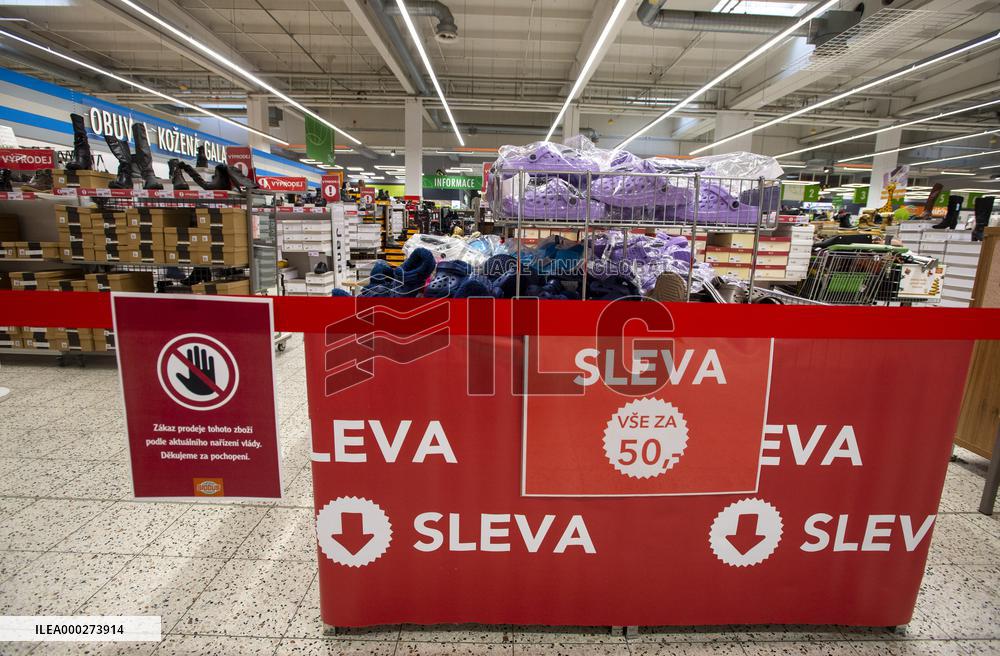 coronavirus restrictions leaflet in Hypermarket Globus