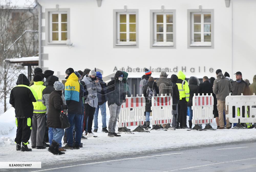 queue of commuters waiting for mandatory coronavirus tests in Bayerisch Eisenstein
