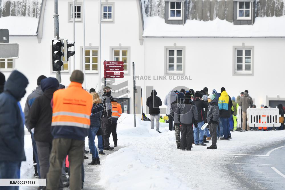 queue of commuters waiting for mandatory coronavirus tests in Bayerisch Eisenstein