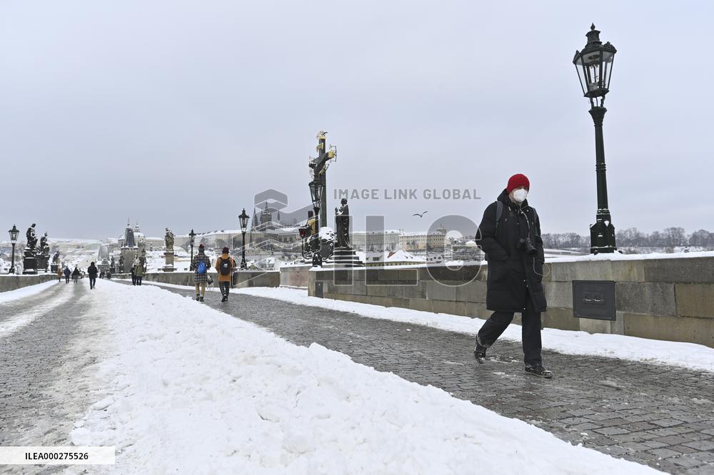 snowy Charles Bridge in Prague