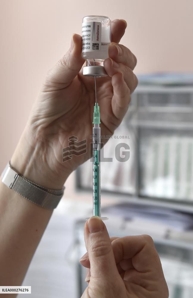 Vaccination of seniors against coronavirus, Czech Republic, ampoule, syringe, AstraZeneca