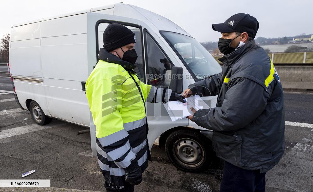 Police control, policemen, car, highway D8, epidemic restrictions