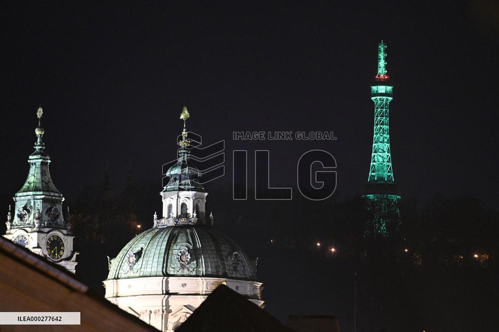 Petrin Tower is green illuminated to celebrate St. Patrick's Day in Prague