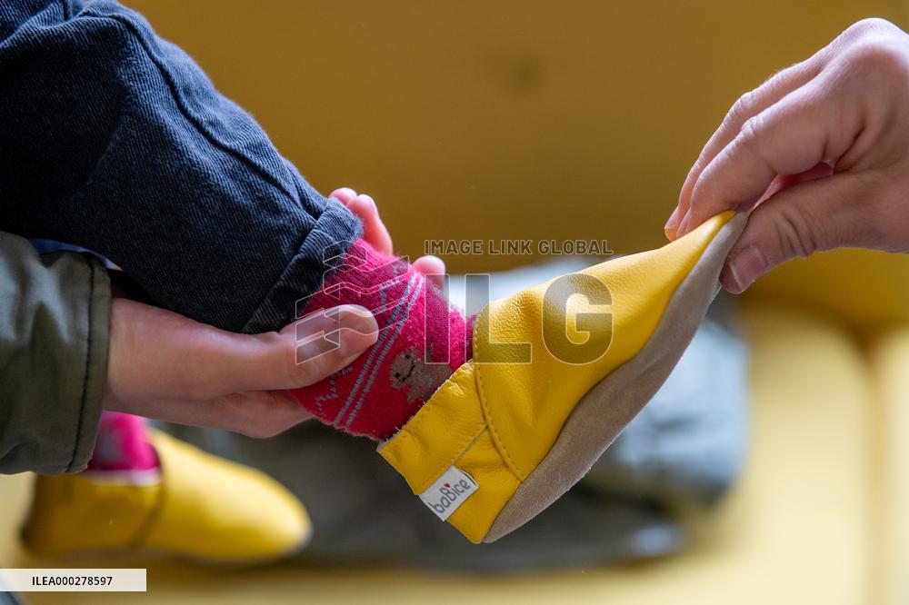 Shops with child clothing and shoes, reopening, shopping