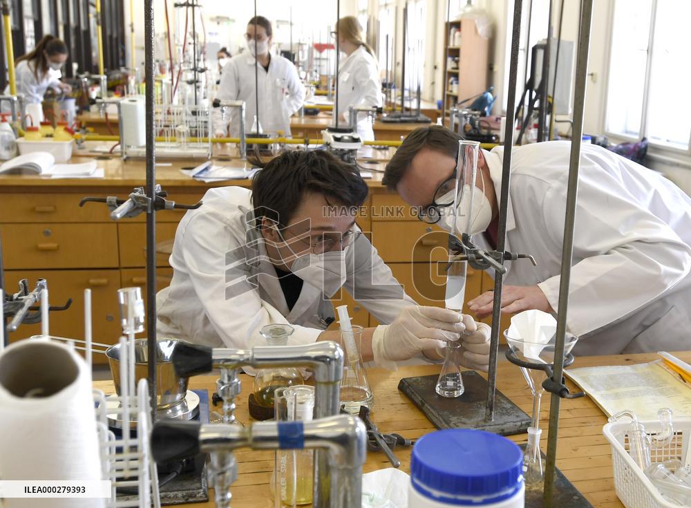 Practical lessons, chemistry laboratory, students, young people