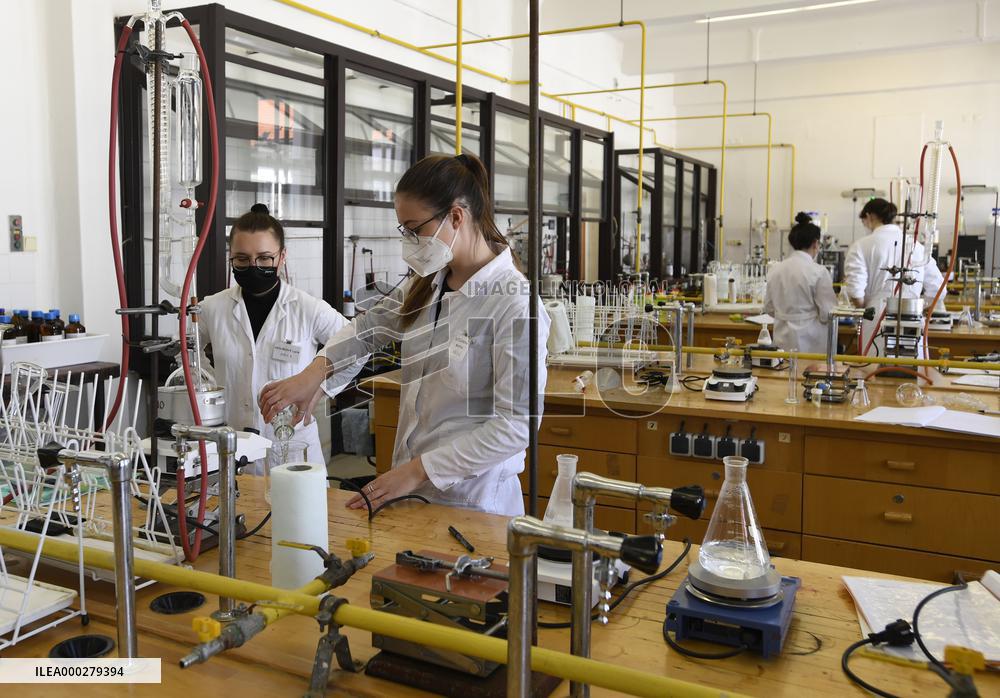 Practical lessons, chemistry laboratory, students, young people