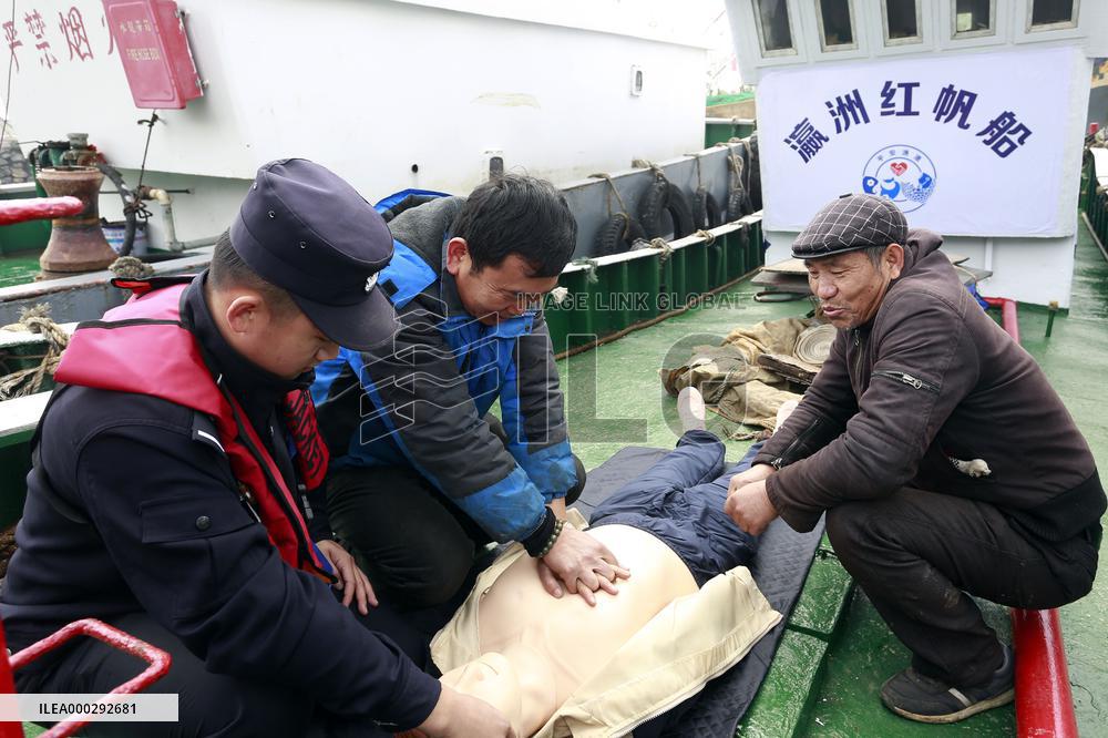 Police Patrol in Fishing Port