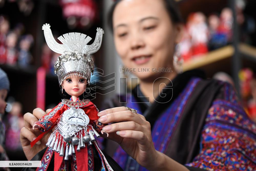 China Guizhou National Costume Doll