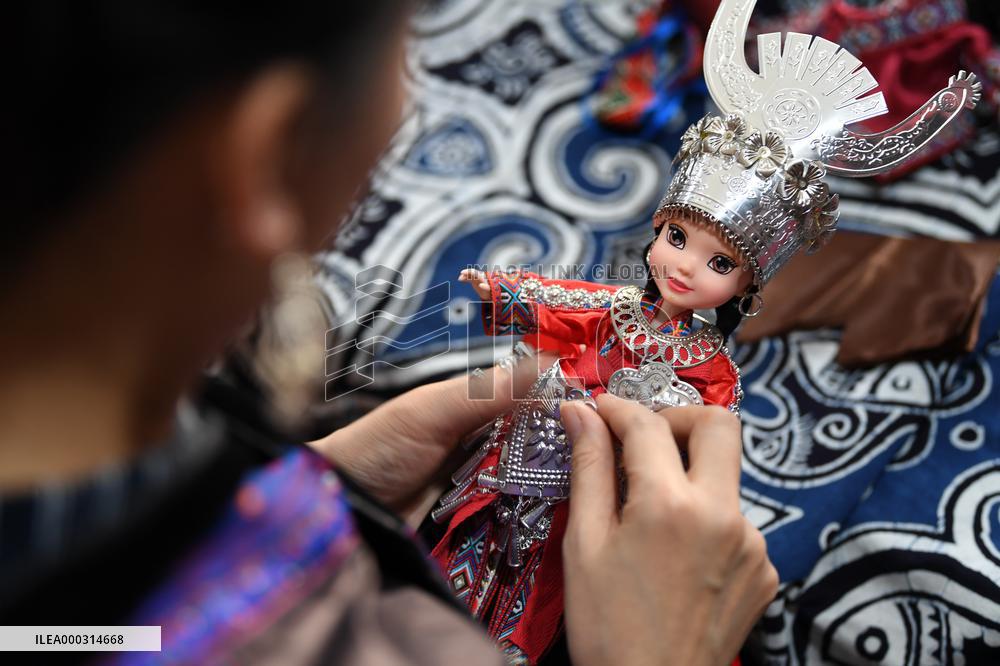 China Guizhou National Costume Doll