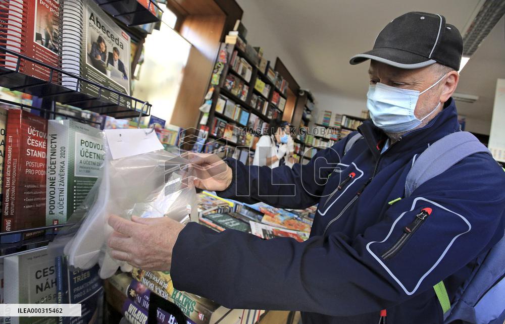 Shop with books, bookshop, customer, sales manager, face mask