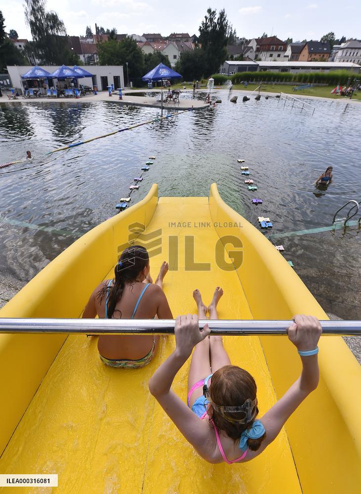 biotope swimming pool, lido, water slide