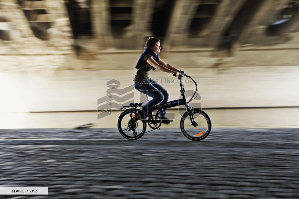 electric bike, electric powered bicycle, e-bike, cyclist, woman