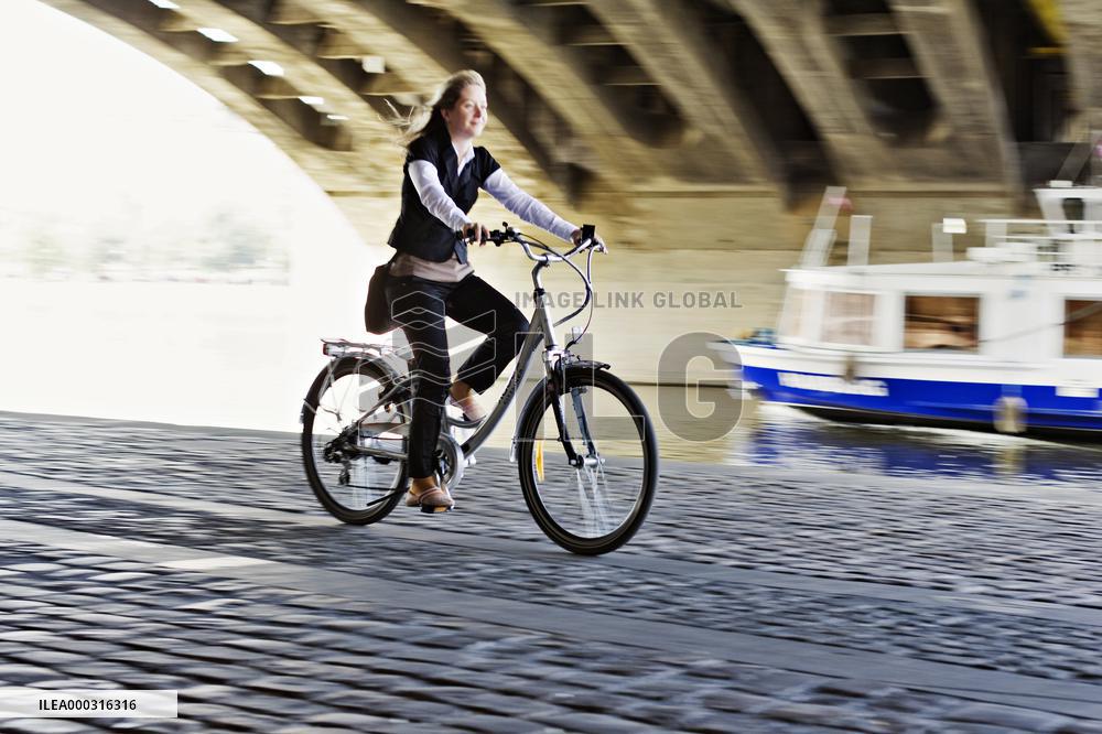 electric bike, electric powered bicycle, e-bike, cyclist, woman