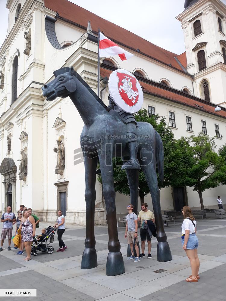 Flag and State Emblem od Belarus on the statue of Moravian Margrave Jost, Brno