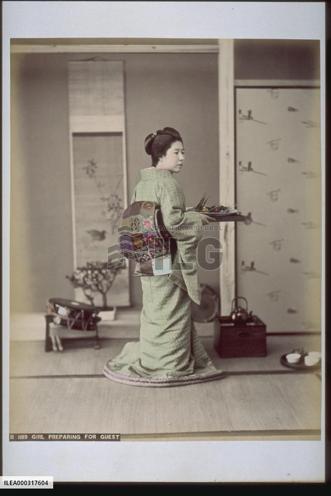 Landlady carrying dishes