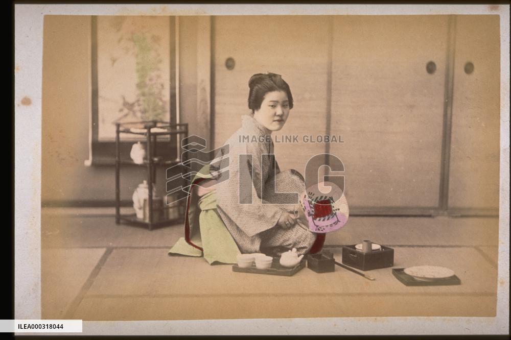 Woman resting in chanoma,a living room