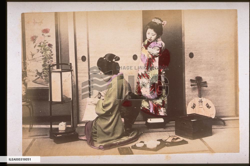 A woman writing a letter