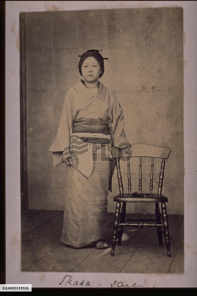 A chair and a woman
