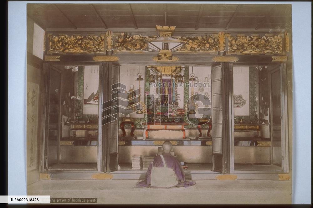 Priest of buddhism offering a morning service