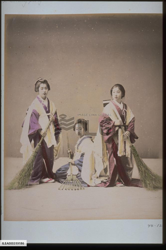 Women cleaning the garden