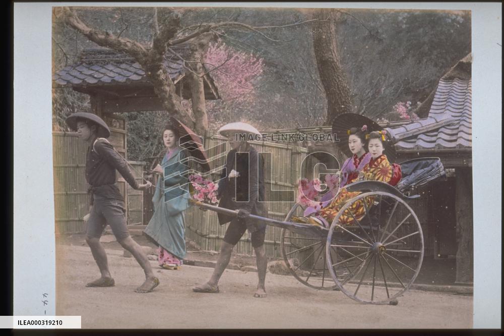 Women on jinrikishas