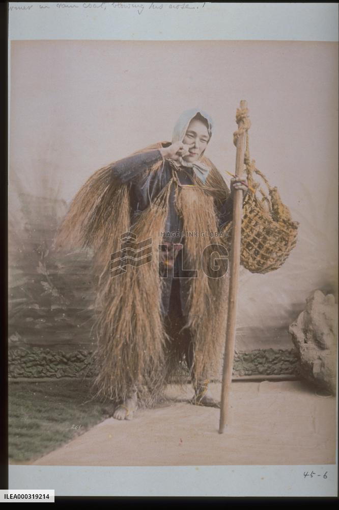 Farmer blowing his nose