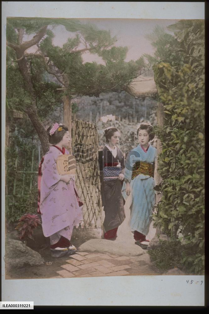 Girls taking a walk in a garden