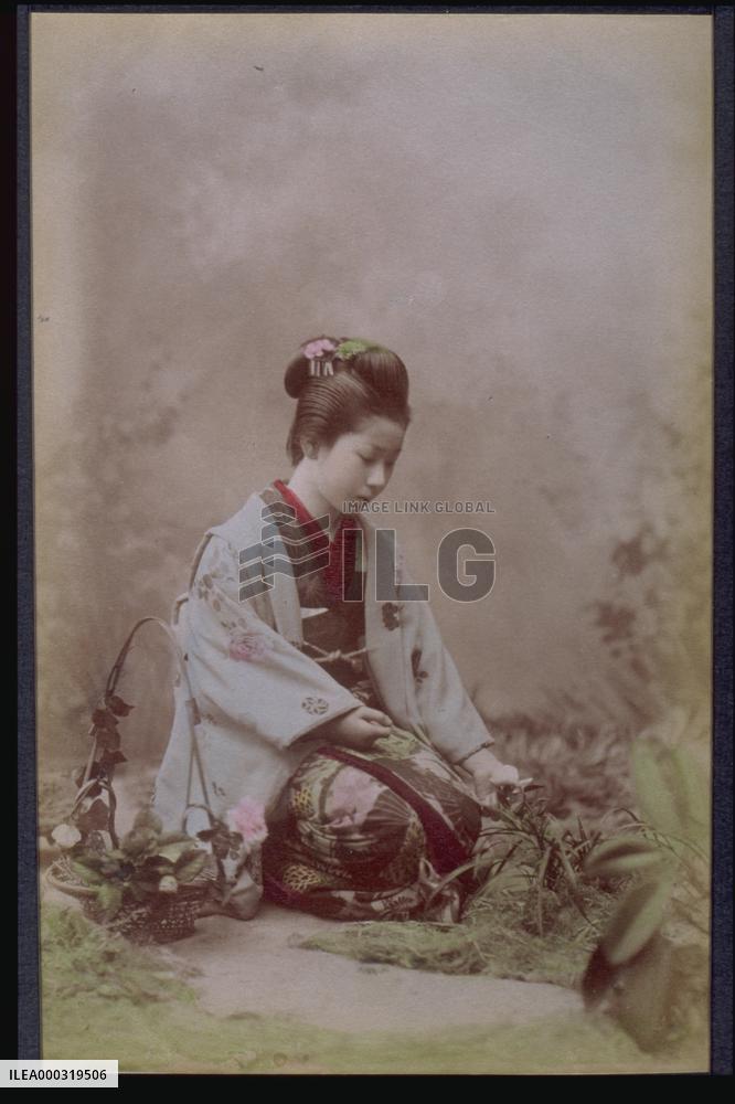 A woman arranging flowers