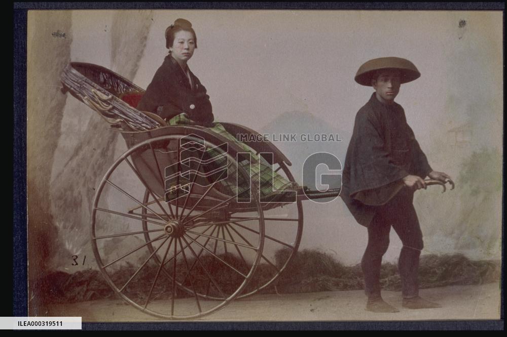 A woman on a jinrikisha