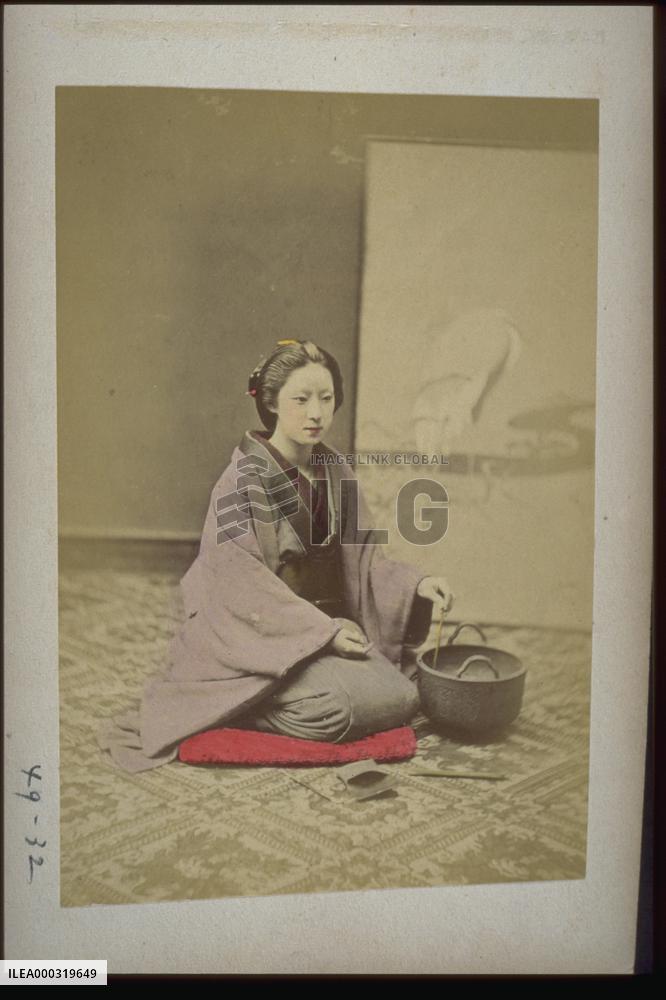 A woman and a brazier