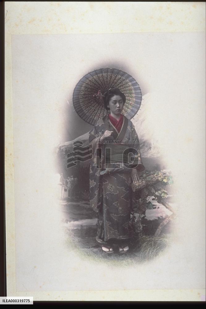 A girl holding an umbrella