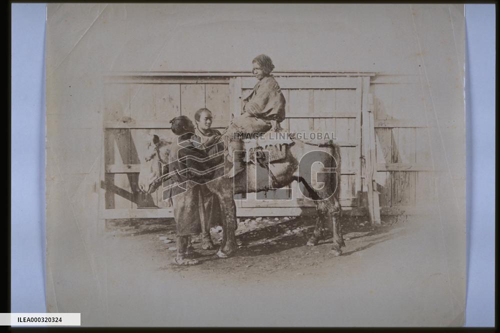 An Ainu riding a horse