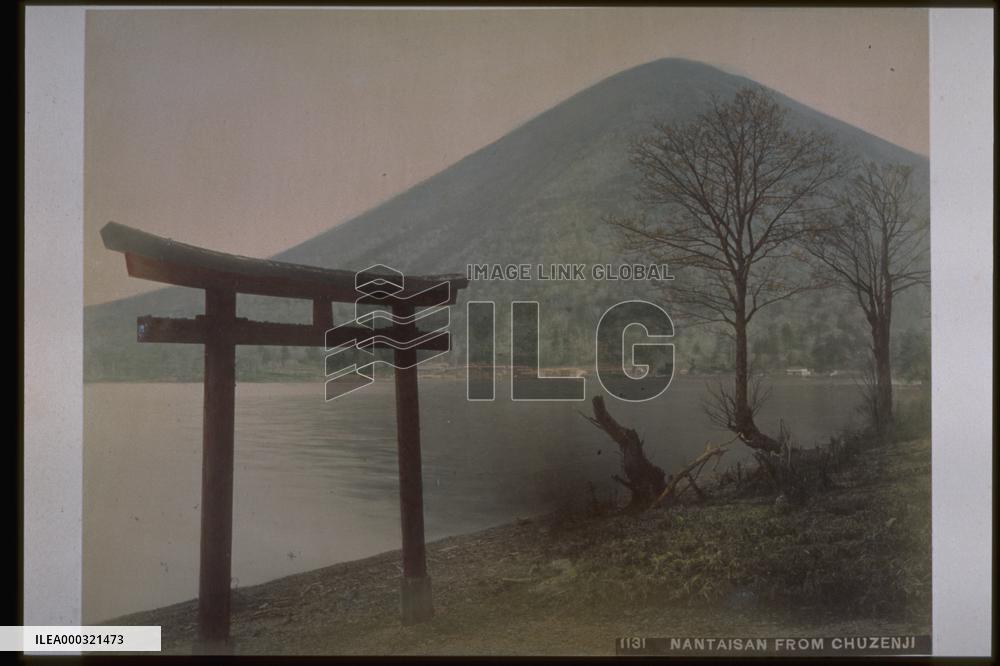 The torii of Chugu Shrine by Lake Chuzenji,and Mt. Nantai