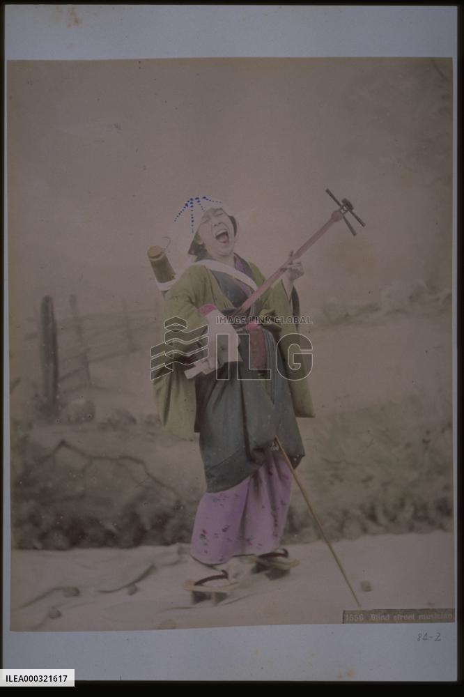 A goze (a blind female street musician)