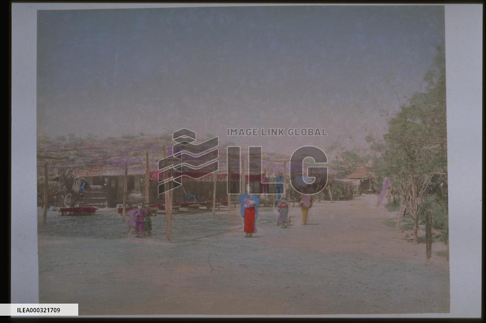 A teahouse with a wisteria trellis