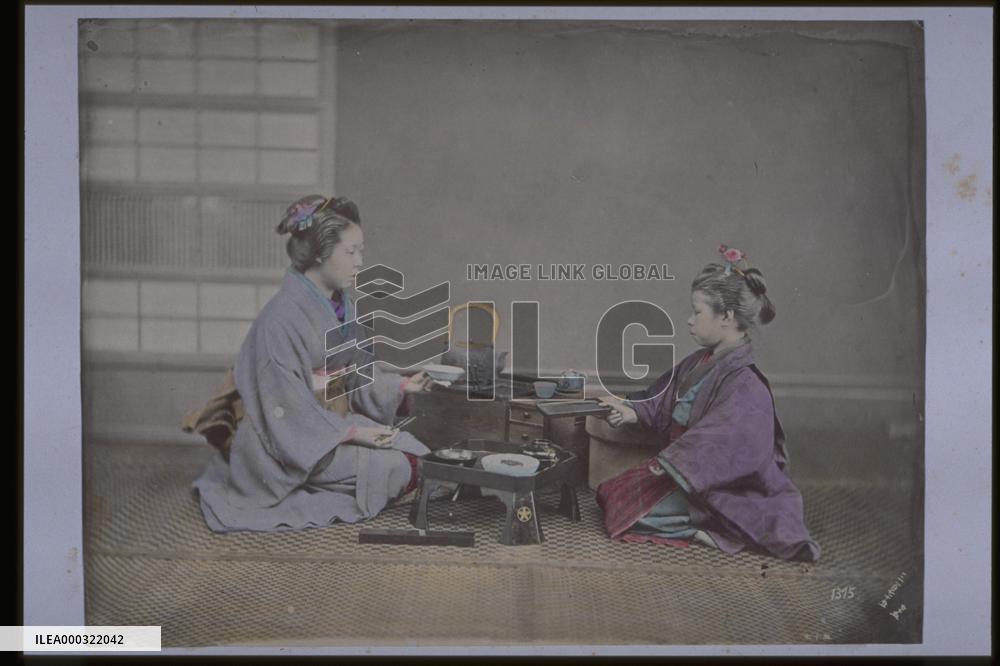 A mother and her daughter having a meal
