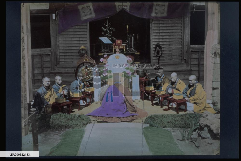 Priests conducting a Buddhist service