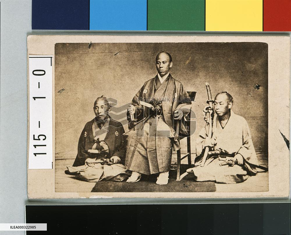 Samurai Sitting on Chair with Two Attendants