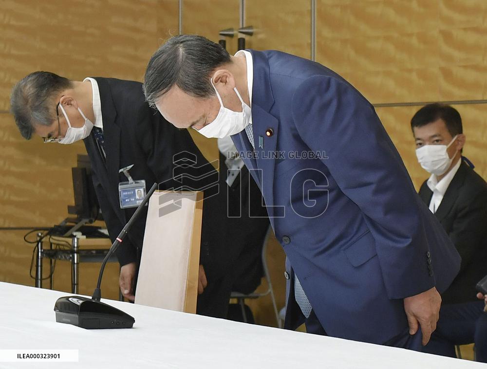 Japan PM Suga apologizes over workers' asbestos diseases