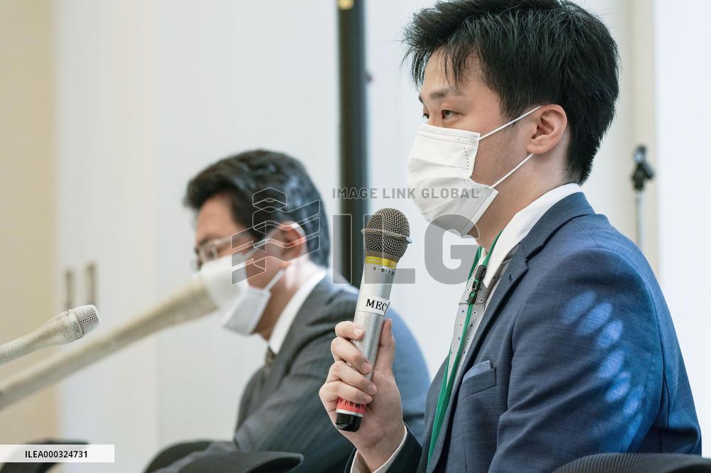 Son of detained Chinese scholar calls for release