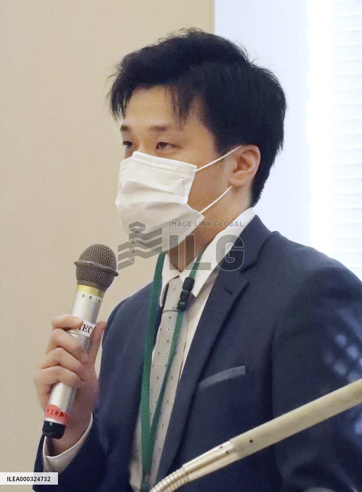 Son of detained Chinese scholar calls for release