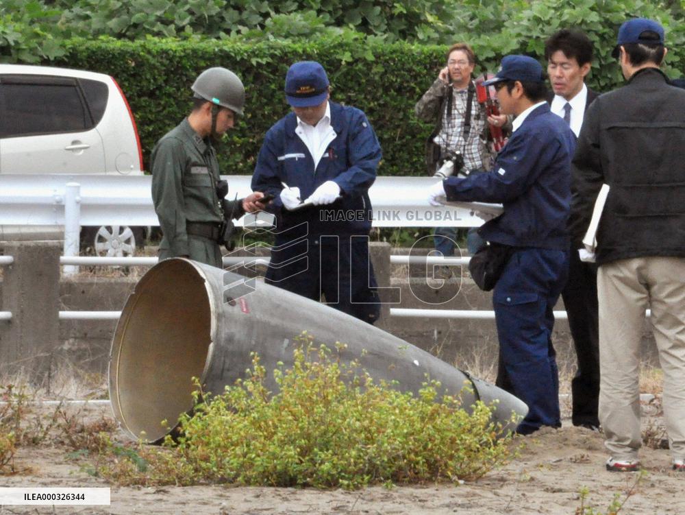 F-15 fighter's empty fuel tank falls to ground